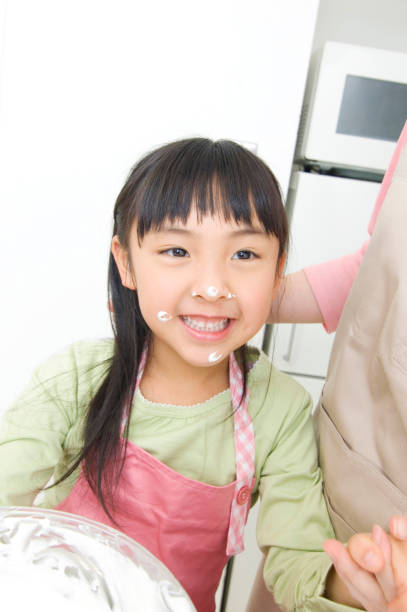 istock Cooking with his mother to daughter 674309018