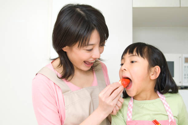 istock To cook mother and child 674309246