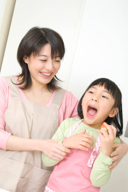 istock To cook mother and child 674309284