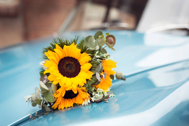 istock Wedding bouquet on a retro car 674312166
