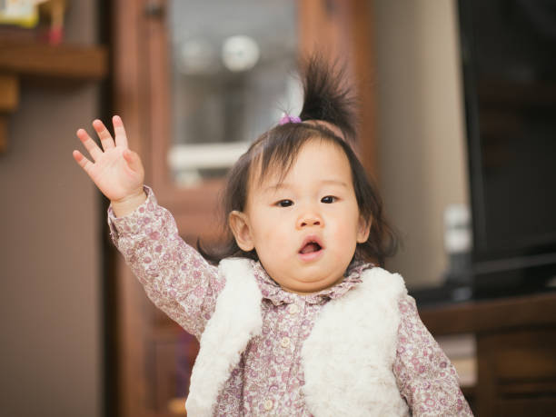 istock baby girl say hello 674312478