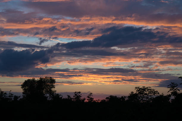 istock sunset landscape with burning sky full of clouds 674318292