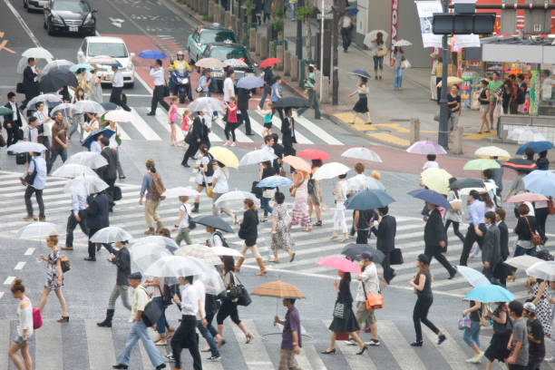 istock People cross the pedestrian crossing 674321834