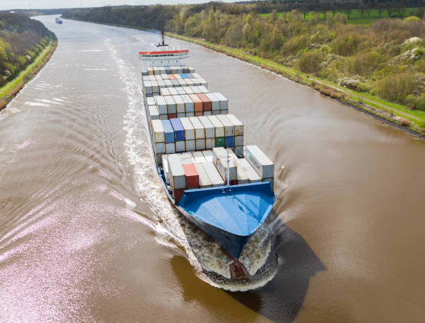 Albersdorf, Germany, April 15, 2017, Container ship "WES AMELIE" in the  North Sea Baltic Canal, in german language Nord - Ostsee Kanal Container ship "WES AMELIE" in the  North Sea Baltic Canal, in german language Nord - Ostsee Kanal or Kiel Kanal kanal stock pictures, royalty-free photos & images