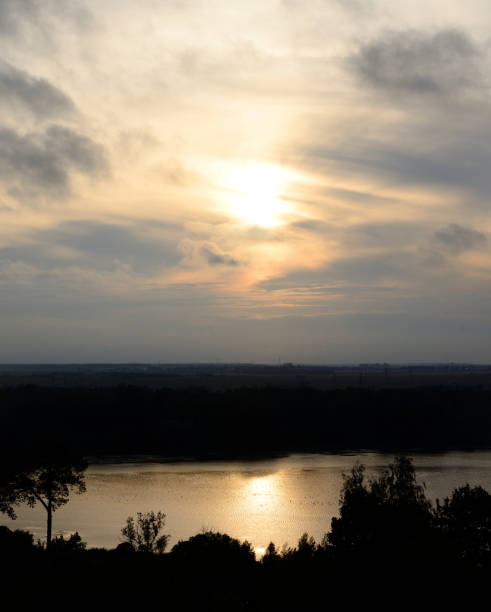 istock Silhouette of a forest against the sunset. 674334560