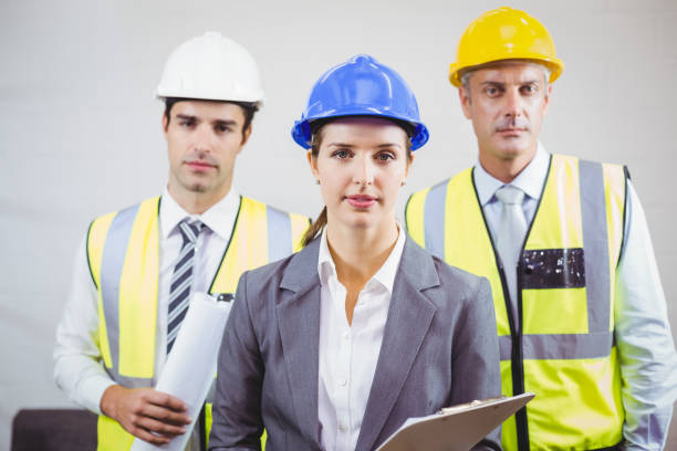 istock Portrait of serious architects with clipboard 674338784