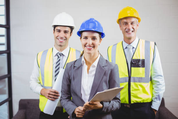 istock Portrait of smiling architects with clipboard 674339006