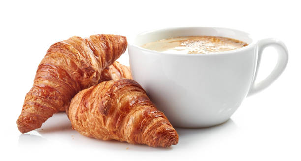 cup of coffee and croissants cup of coffee and croissants isolated on white background croissant stock pictures, royalty-free photos & images