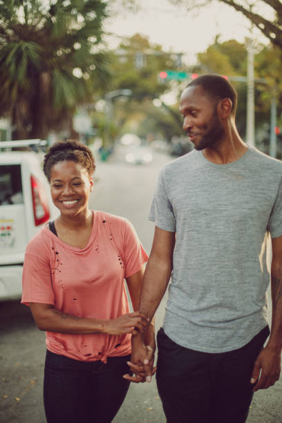 istock Dating Couple walking around in Key West during sunset 674353056