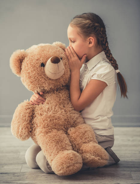 istock Little girl with toy 674356280