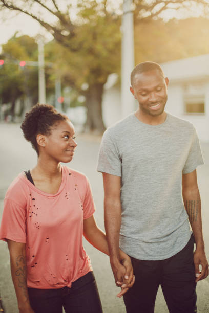 istock Dating Couple walking around in Key West during sunset 674358944