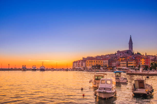 The Old Town and Harbour of Rovinj at sunset The Old Town and Harbour of Rovinj on a beautiful summer evening. rovinj harbor stock pictures, royalty-free photos & images