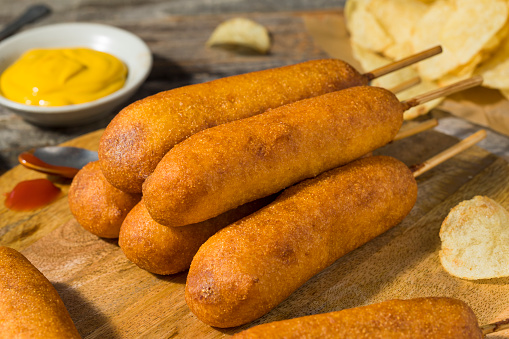 Homemade Deep Fried Corn Dogs with Mustard and Ketchup