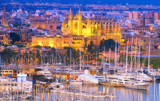 La Seu (Cathedral of Palma) and harbour at dusk Aerial view on the harbor and cathedral of Palma, Mallorca (Spain). palma majorca stock pictures, royalty-free photos & images