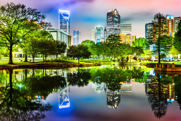 istock Charlotte, NC skyline reflected in Marshall Park pond 674377994