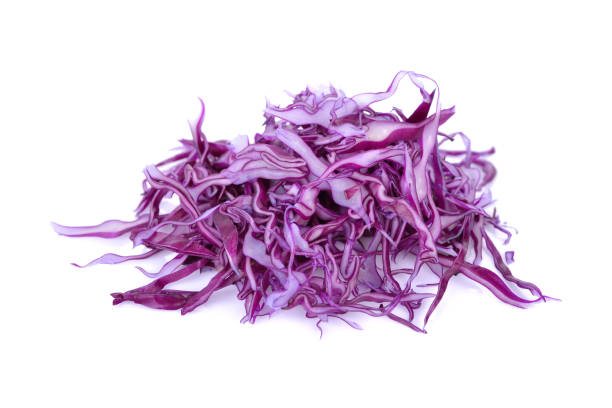 istock pile of sliced fresh red cabbage on white background 674378318