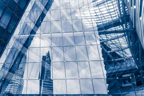 istock Modern glass wall of office building 674391304