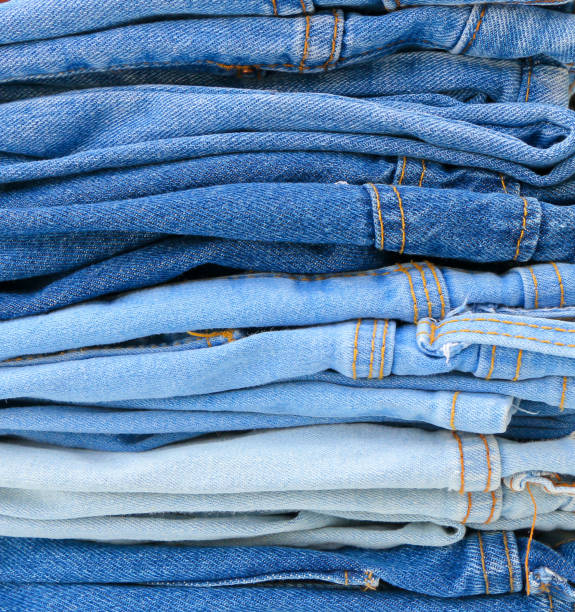 istock Stacked fashion blue jeans 674403496