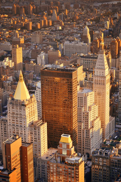 New York City historical skyscrapers New York City historical skyscrapers and urban cityscape at sunset. new york life building stock pictures, royalty-free photos & images