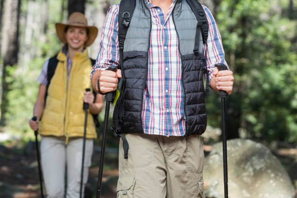 istock Front view of couple hiking 674424304