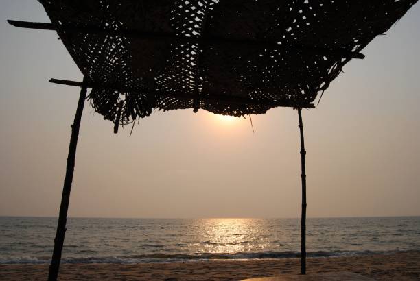istock Sun shelter at Querim Beach, North Goa 674434858