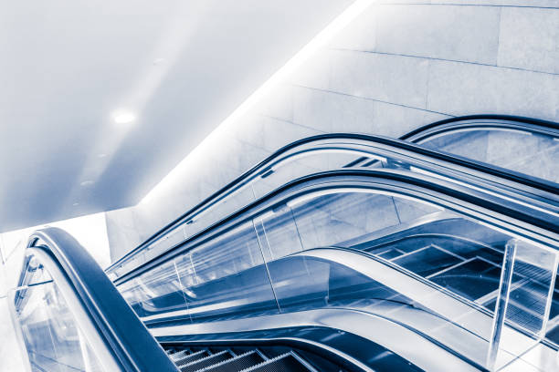 istock Escalators in a clean modern shopping mall 674437750