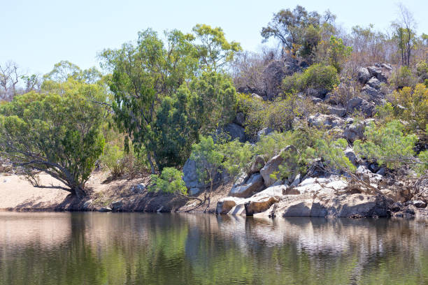 istock Rocks on edge of billabong 674441428