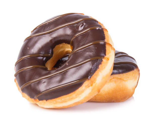 pączki czekoladowe na tle - donut glazed bakery unhealthy eating zdjęcia i obrazy z banku zdjęć
