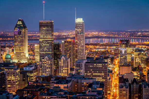 Illuminated glowing Cityscape of Downtown Montreal a Night - Twilight. Montreal, Quebec, Canada