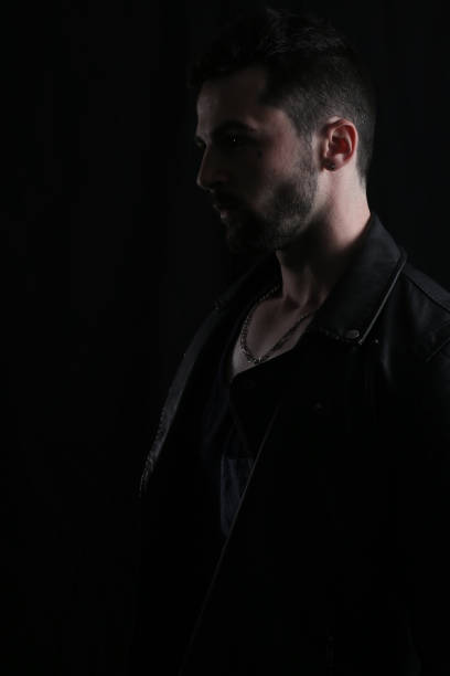 istock Dramatic picture of a man wearing a leather jacket 674447218