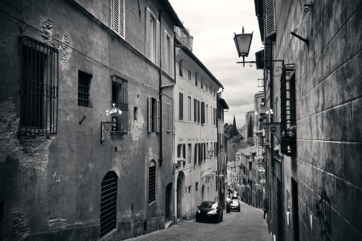 Street view with old buildings in Siena, Italy.