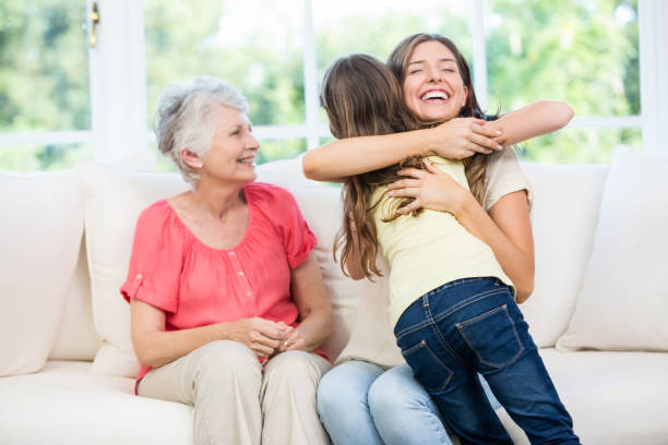 istock Girl hugging mother with granny 674452670