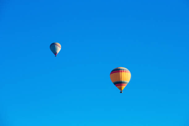 istock balloons flying over the Cappadocia 674452958
