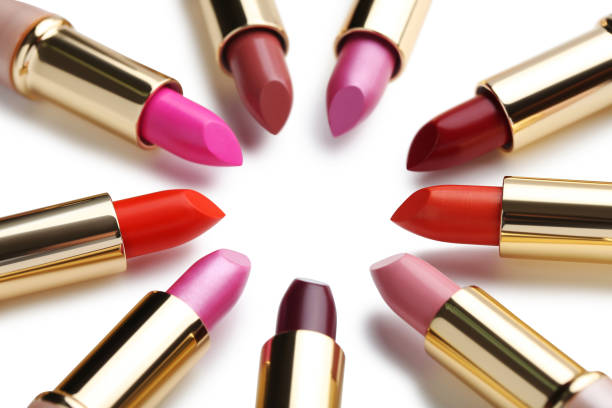 istock Colorful lipsticks isolated on a white 674467394