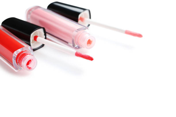 istock Colorful lip gloss isolated on a white background 674470052