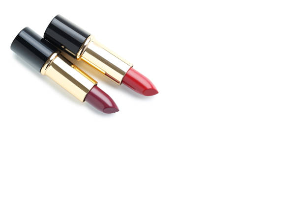 istock Colorful lipsticks isolated on a white 674472752