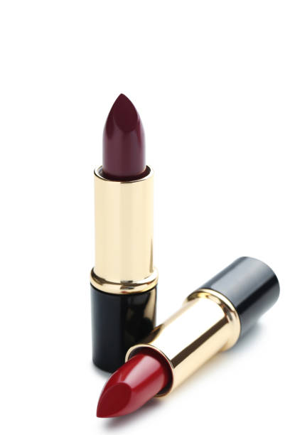 istock Colorful lipsticks isolated on a white 674472900