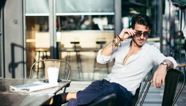 istock Elegant gentleman in cafe 674473544