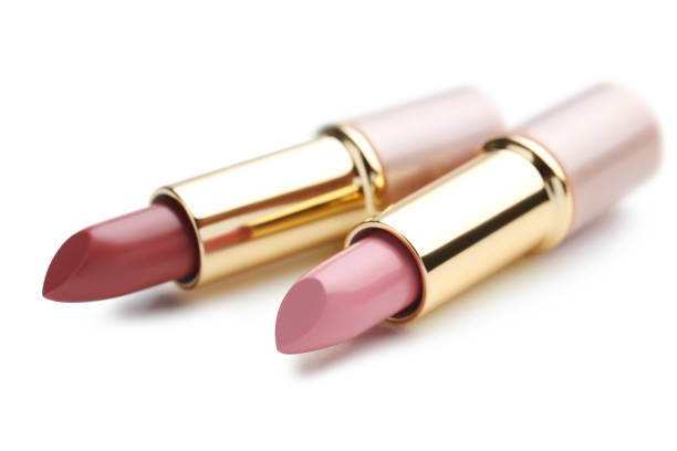 istock Colorful lipsticks isolated on a white 674476054