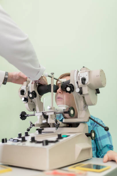 istock Boy at the eye doctor 674476106