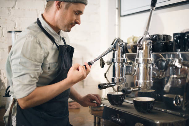 istock Coffee Machine Barista Grinder Steam Cafe Concept 674476118