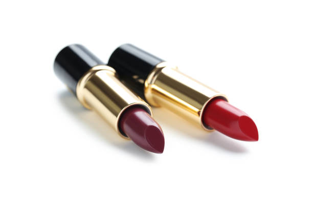 istock Colorful lipsticks isolated on a white 674476276