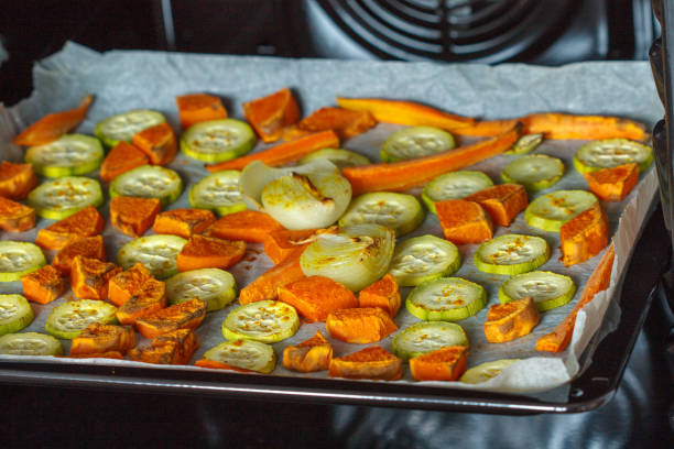 istock Baked sweet potato, zucchini and carrots 674487112