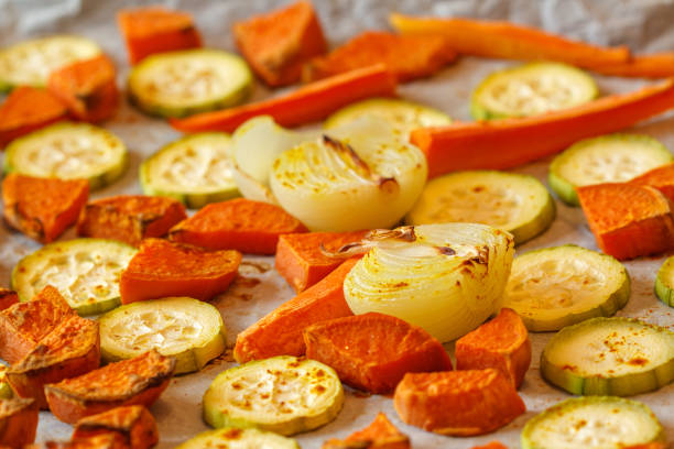 istock Baked sweet potato, zucchini and carrots 674487582