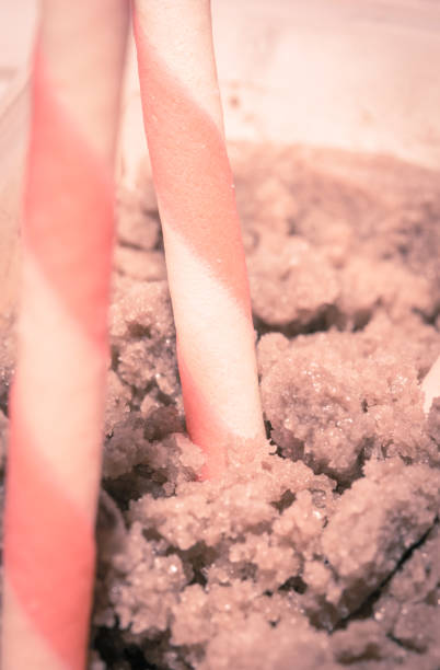 wafer rolls wafer rolls filled with strawberry. retro filter ice cream with wafer rolls stock pictures, royalty-free photos & images