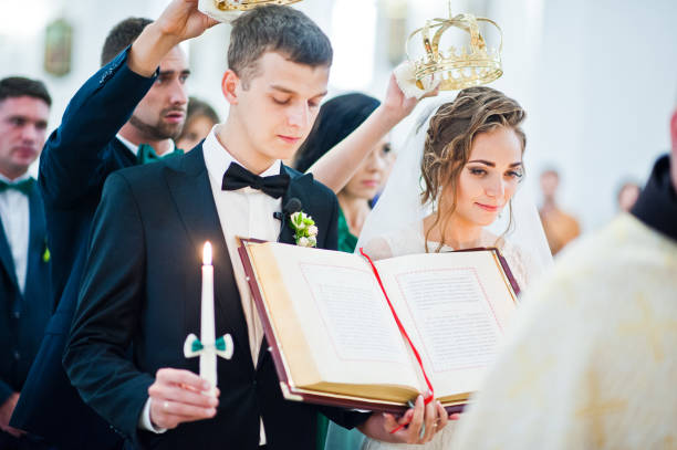 istock Wedding couple in love at church 674500678