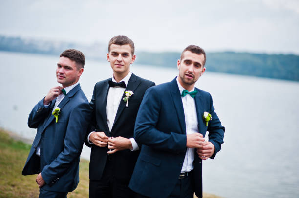 istock Three friends, groom with groomsman having fun 674501618