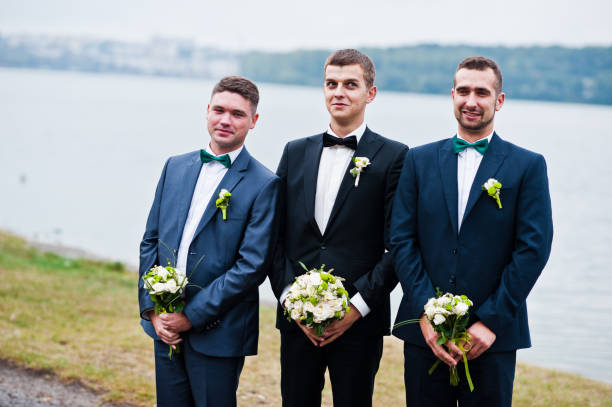 istock Three friends, groom with groomsman having fun 674501622