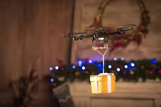 Hexacopter drone flying with gift box