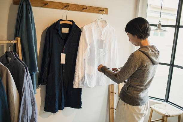 istock Female owner preparing to open store in General shop. 674503474